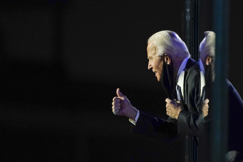 President-elect Joe Biden gestures to the crowd after he spoke Saturday, Nov. 7, 2020, in Wilmington, Del. (AP Photo/Carolyn Kaster)