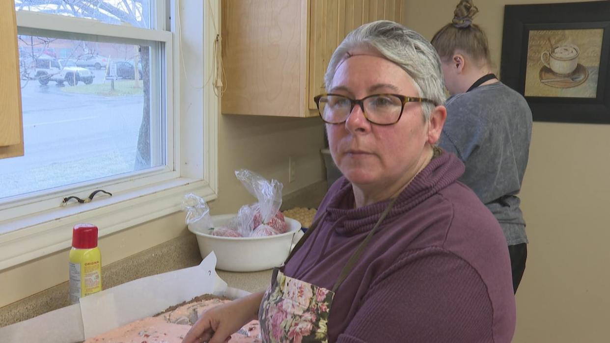 'Some of the clients have a goal to live on their own, have an apartment of their own, so all the skills that they're learning here will give them the confidence to know that they can do it on their own,' says Judy Hennessey, executive director of Harbourview Training Centre. (Laura Meader/CBC - image credit)