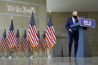 Democratic presidential candidate and former Vice President Joe Biden removes his face mask to begin speaking at the Constitution Center in Philadelphia, Sunday, Sept. 20, 2020, about the Supreme Court. (AP Photo/Carolyn Kaster)