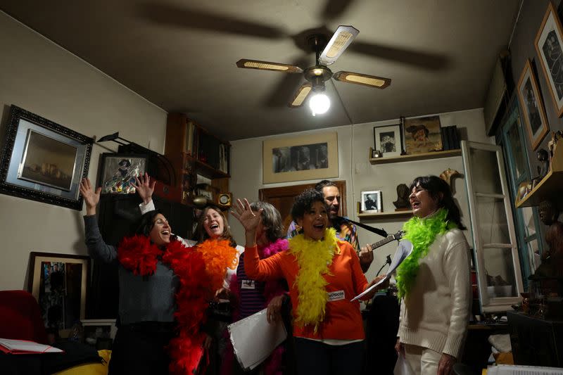 Artists perform during a protest action in one of the apartments whose residents fear they will be evicted in the event of purchase of the whole building by a real estate investment fund, in Madrid