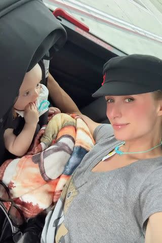 <p>parishilton/Instagram</p> Paris Hilton poses with son Phoenix in a car, as shared on her Instagram Story.