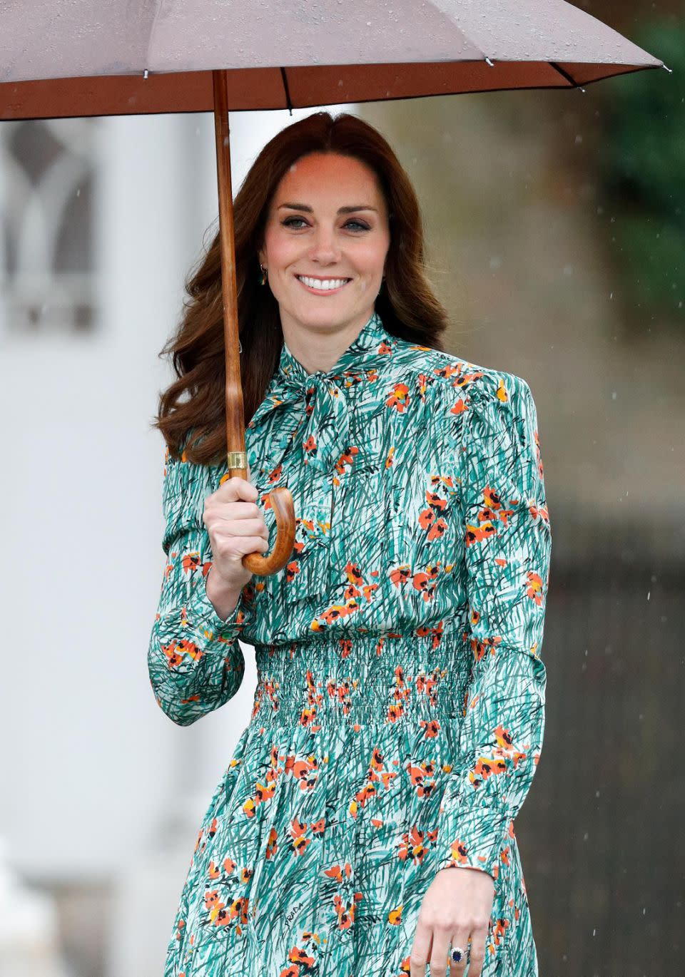 The Duchess was in high spirits and showing no signs of pregnancy in a recent public appearance. Source: Getty