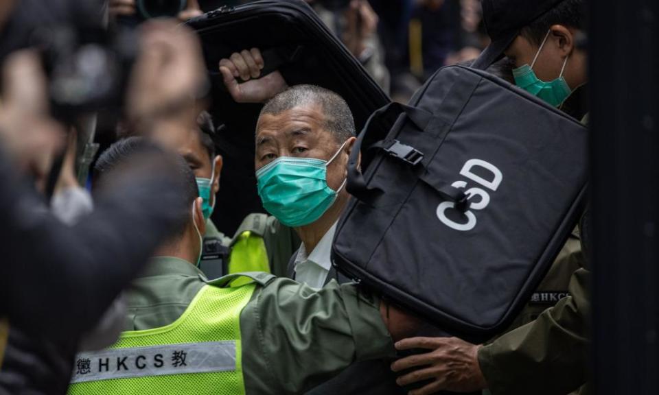 Jimmy Lai is escorted to the Hong Kong appeal court in February 2021.