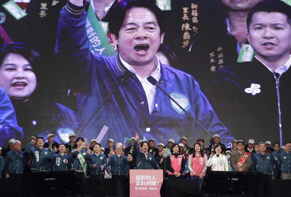 FILE - Taiwan Vice President and Democratic Progressive Party presidential candidate William Lai, center, delivers a speech during an election campaign in New Taipei City, Taiwan, Saturday, Jan. 6, 2024. Taiwan will hold its presidential election on Jan. 13, 2024. (AP Photo/Chiang Ying-ying, File)