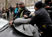 <p>New York City Council member Jumaane D. Williams is detained by police during a demonstration by activists against deportation outside the Jacob Javits Federal Building in Manhattan in New York City, Jan. 11, 2018. (Photo: Eduardo Munoz/Reuters) </p>