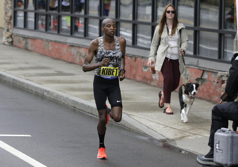 Elkanah Kibet, of Fountain, Colo., leads the pack during the 123rd Boston Marathon on Monday, April 15, 2019, in Framingham, Mass. (AP Photo/Steven Senne)