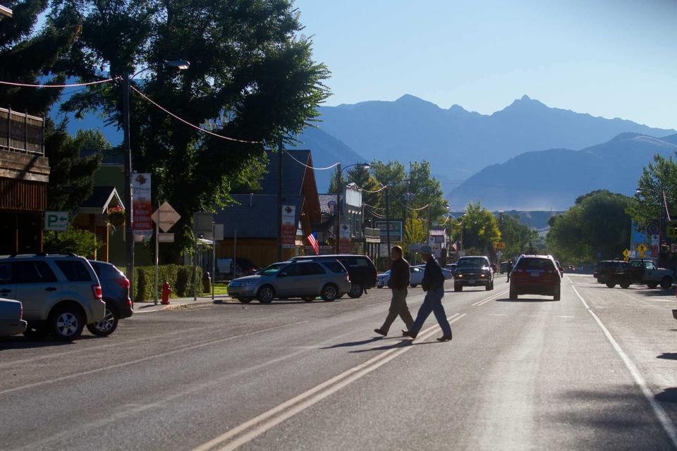 People walking across the street in Ennis, Montana