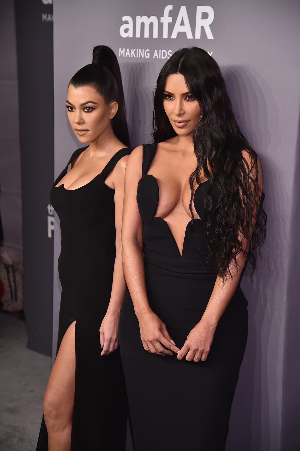 Kourtney and Kim pose on the red carpet together