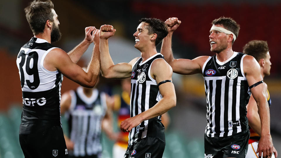 Port Adelaide wore the 'prison bar' jumpers during the Showdown match against the Adelaide Crows last season. (Photo by Daniel Kalisz/Getty Images)