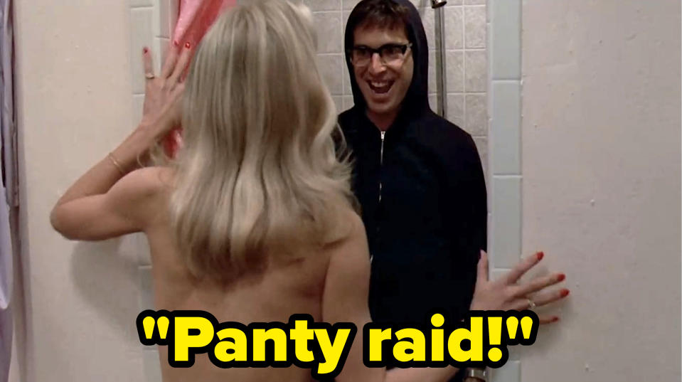 woman opening a shower curtain to a man in a hoodie saying, panty raid