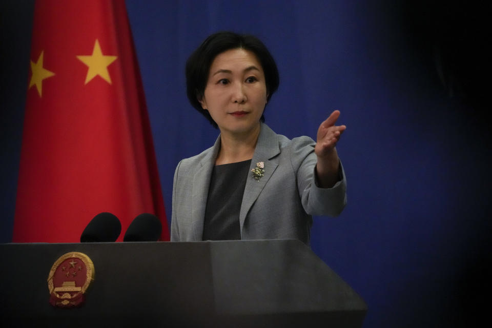 Chinese Foreign Ministry spokesperson Mao Ning gesture during a daily briefing at the Ministry of Foreign Affairs office in Beijing, Thursday, April 6, 2023. China vowed reprisals against Taiwan Thursday after a meeting between the U.S. House Speaker and the island's President, saying the U.S. was on a "wrong and dangerous road." (AP Photo/Andy Wong)