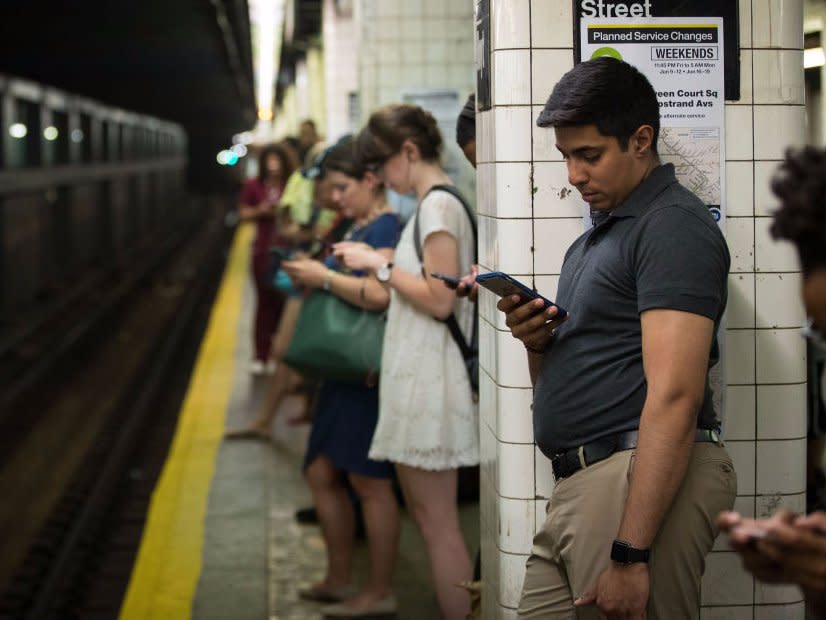 New York City subway platform waiting commuters