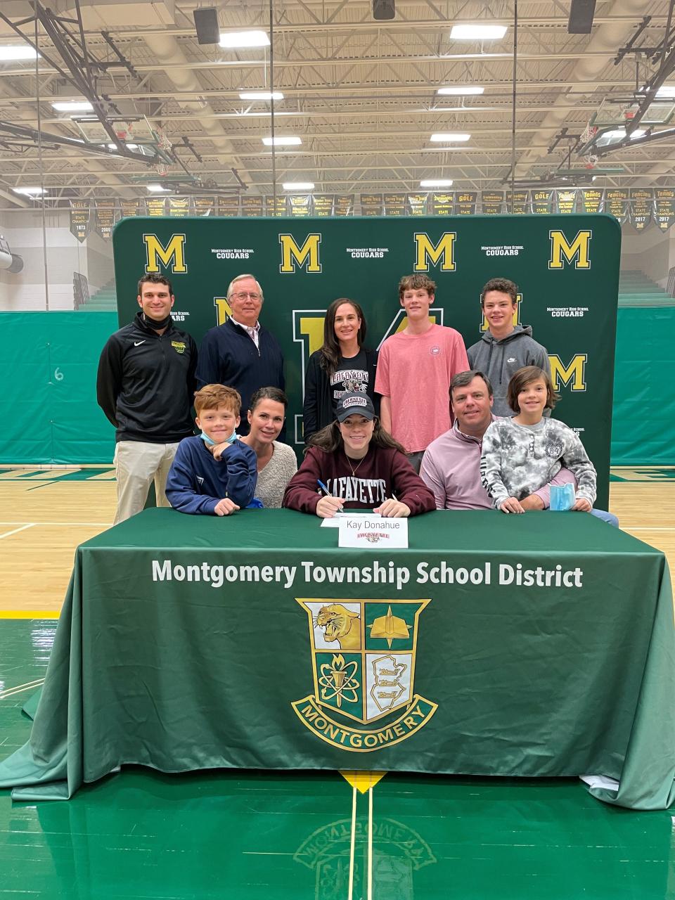 Montgomery's Kay Donahue signs her National Letter of Intent to attend Lafayette College on Wednesday, Nov. 10, 2021.