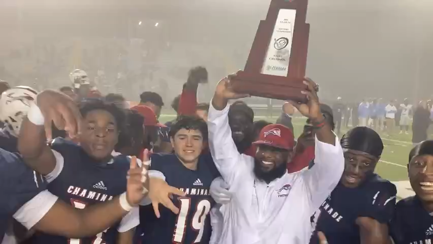 The Chaminade-Madonna Lions celebrate winning the Class 3A title after a 21-0 victory vs Berkeley Prep at Cox Stadium.