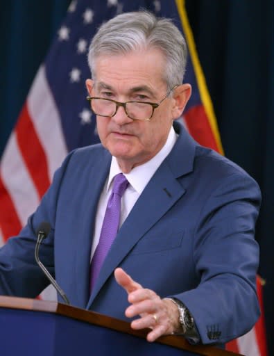 Federal Reserve Chairman Jerome Powell is walking a narrow path as he tries to send a clear signal about interest rates