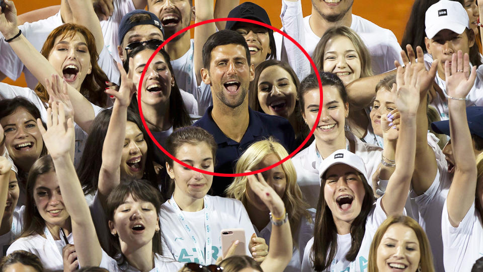 Novak Djokovic, pictured here with tournament volunteers after the Belgrade leg of the Adria Tour. 