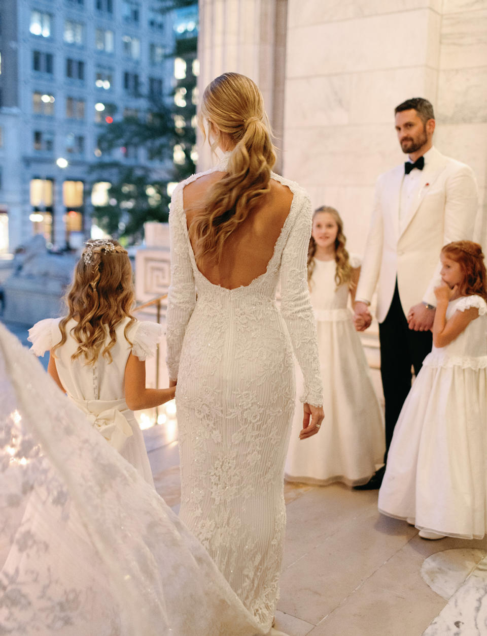 <p>Love's longtime agent Jeff Schwartz officiated the couple's wedding, and his daughters served as the flower girls. "It felt so personal and nice to be surrounded by people we love," the couple shares. </p>