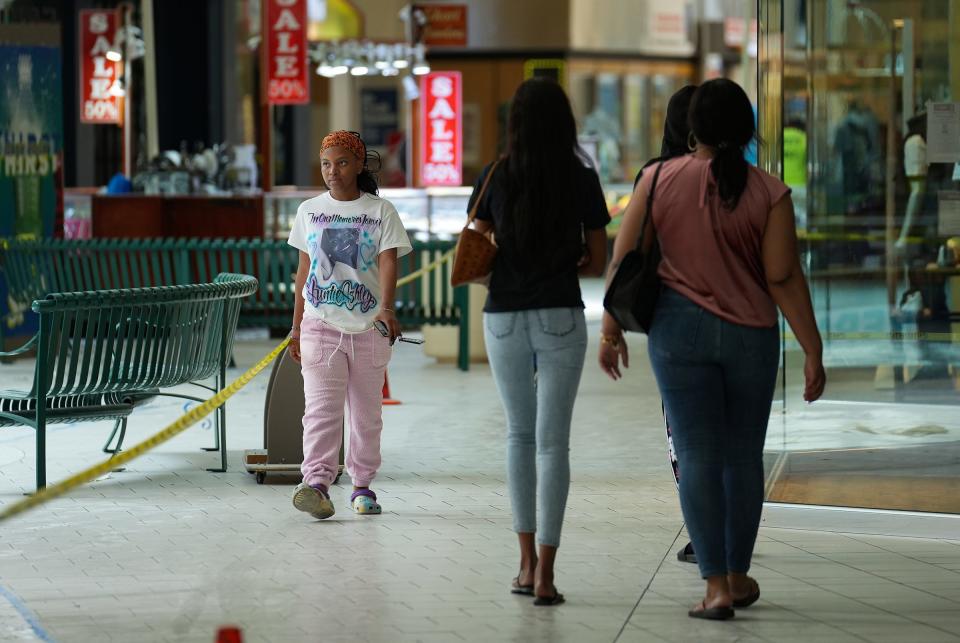 Shoppers walk through Lafayette Square Mall on Monday, June 6, 2022, in Indianapolis. The shopping mall, purchased by Sojos Capital in 2021, is at the core of a $200 million "Window to the World" mixed-use development project. 