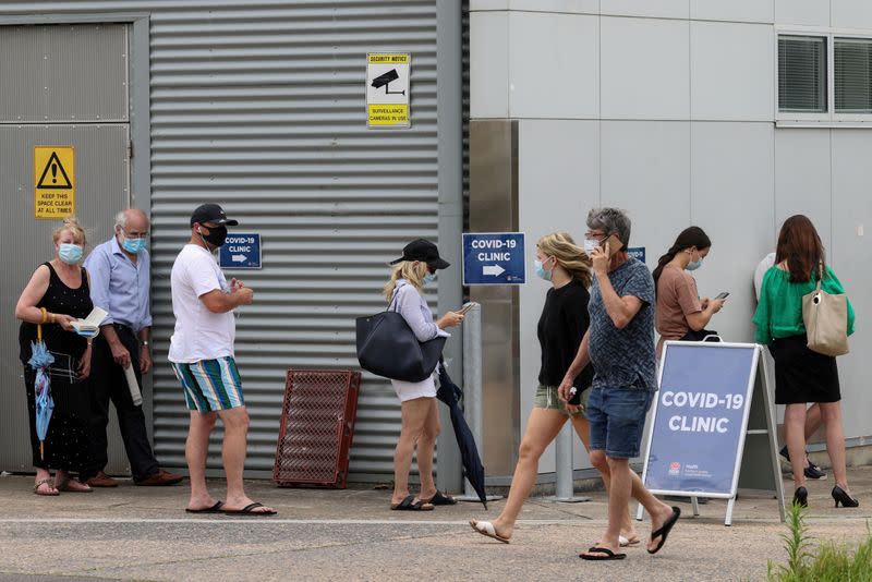 FILE PHOTO: The queue at a coronavirus disease testing clinic is pictured in Sydney