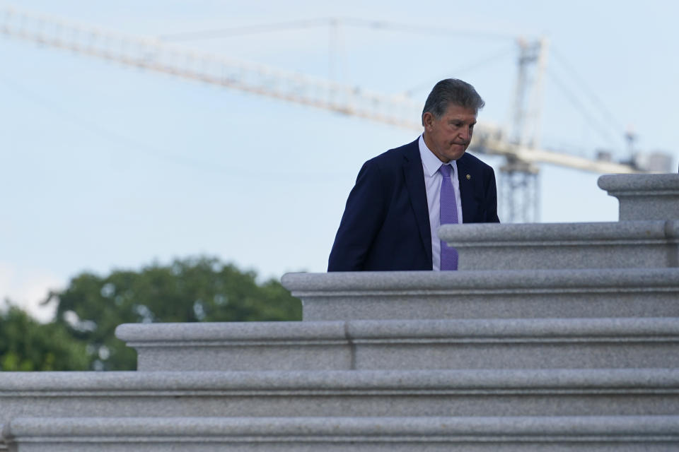 Sen. Joe Manchin, D-W.Va., walks up the steps of Capitol Hill in Washington, Monday, June 7, 2021. (AP Photo/Susan Walsh)