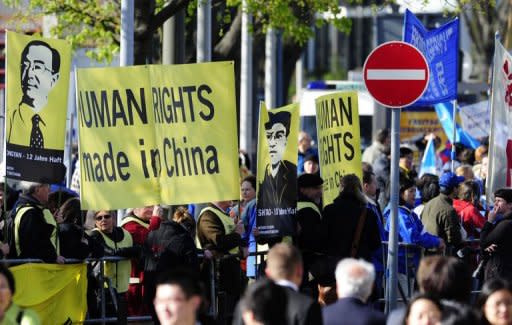 Demonstrators protest against China's policy on the sidelines of the Hannover Messe (Hanover Fair) in Hanover. Outside the congress centre in Hanover on Sunday evening, around 200 protestors staged a small demonstration, waving Tibetan flags and shouting slogans about China's human rights record