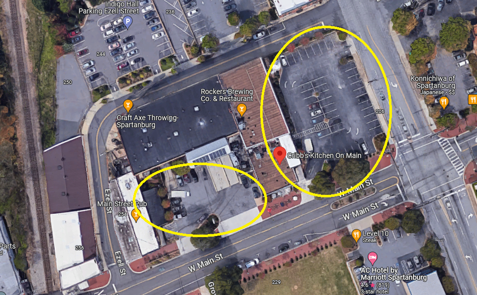 An aerial view of the two parking lots that are now pay-to-park lots.