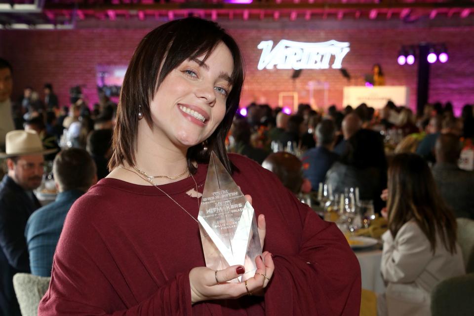 Billie Eilish rocks her new hair color and cut at Variety's Hitmakers Brunch Dec. 4, 2021.