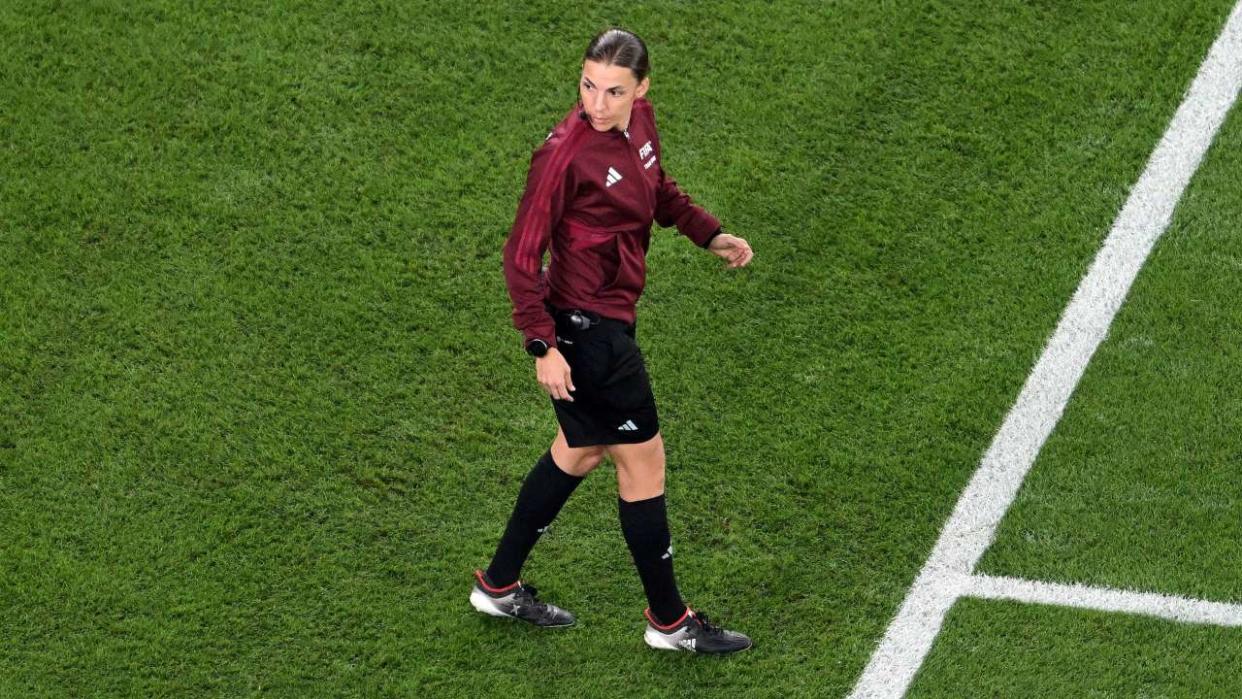 (FILES) This file photo taken on November 22, 2022 shows French fourth official Stephanie Frappart during the Qatar 2022 World Cup Group C football match between Mexico and Poland at Stadium 974 in Doha. - France's Frappart is to be first woman referee at men's World Cup, the FIFA announced on November 29, 2022. (Photo by Kirill KUDRYAVTSEV / AFP)