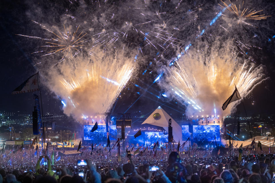 Fireworks illuminate the night sky as  crowds gather to watch Elton John perform at Glastonbury 2023