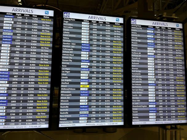 PHOTO: An arrival board displays the status of flights at the Denver International Airport, as flights were grounded after FAA system outage, in Denver, Jan. 11, 2023. (Chris Wicklund via Reuters)