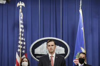 Acting Assistant Attorney General Brian Rabbitt, of the Justice Department's Criminal Division and other officials, speak, Thursday, Oct. 22, 2020, at the Justice Department in Washington. A subsidiary of Goldman Sachs pleaded guilty on Thursday and agreed to pay more than $2 billion in a foreign corruption probe tied to the Malaysian 1MDB sovereign wealth fund, which was looted of billions of dollars in a corruption scandal. The company, Goldman Sachs Malaysia, entered the plea in federal court in Brooklyn. (Yuri Gripas/The New York Times via AP, Pool)