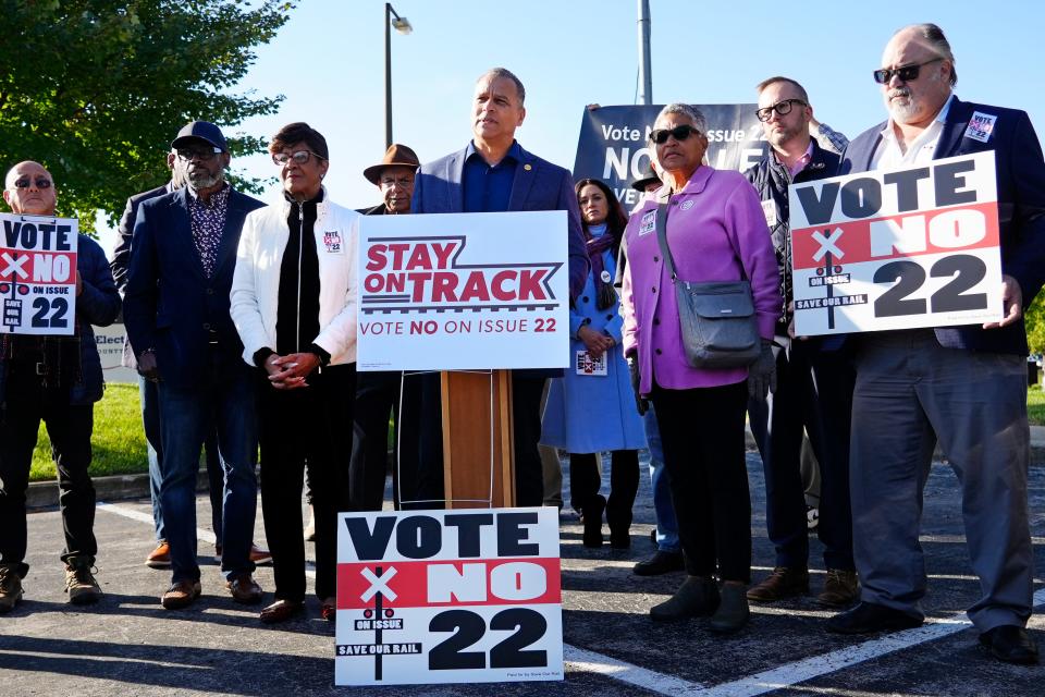 Abby Friend, one of the founders of ‘Derail the Sale’, speaks at a press conference hosted by the Cincinnati NAACP at the Board of Elections in Norwood to urge voters to vote no on Issue 22, Wednesday, Oct. 11, 2023. Issue 22 is asking voters to allow the city of Cincinnati to sell the Cincinnati Southern Railway they have owned since the 1880’s. In urging voters to vote no, Friend said the city needs to grow a spine and get a deal that’s good for future generations. She said, they (the city) is telling us one thing and doing the other.