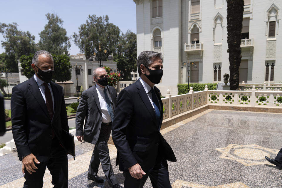 Secretary of State Antony Blinken, right, arrives for a meeting with Egyptian President Abdel-Fattah el-Sissi at the Heliopolis Presidential Palace, Wednesday, May 26, 2021, in Cairo, Egypt. (AP Photo/Alex Brandon, Pool)