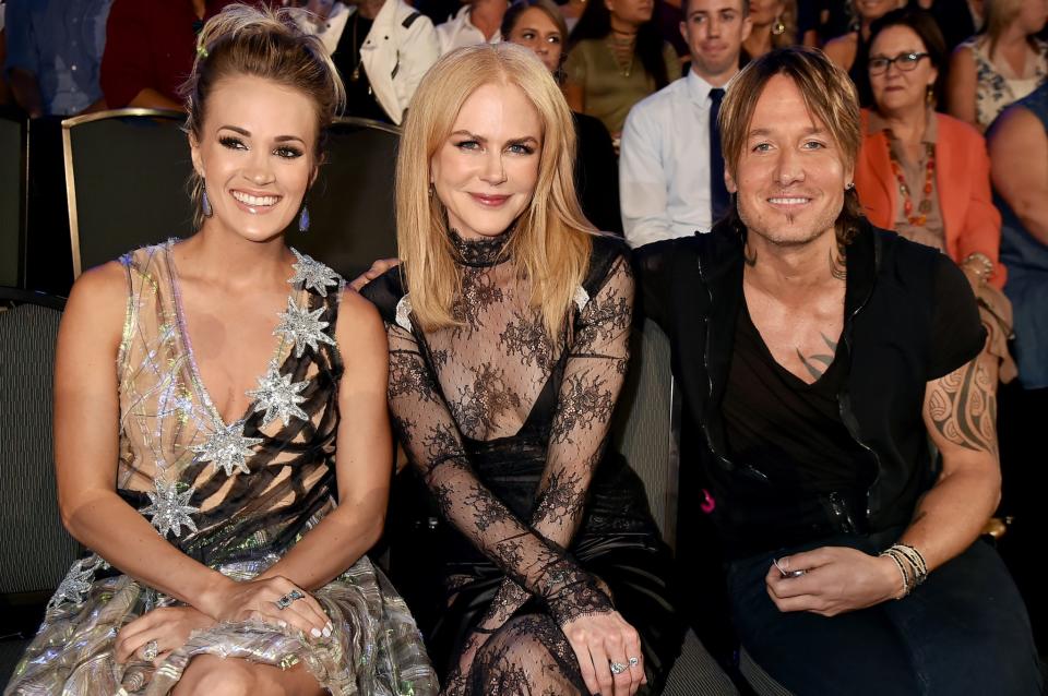 <p>(L-R) Carrie Underwood, Nicole Kidman and Keith Urban in the audience during the 2017 CMT Music Awards at the Music City Center on June 7, 2017 in Nashville, Tennessee. (Photo by Jeff Kravitz/FilmMagic) </p>