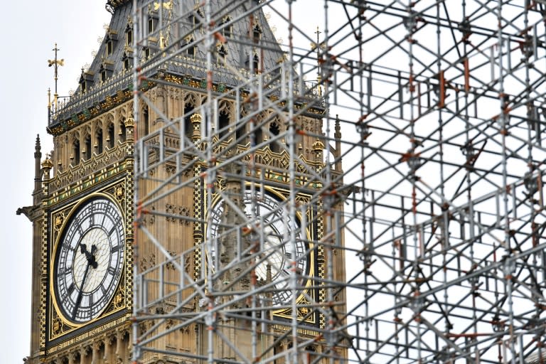 London's Elizabeth Tower looms over the Houses of Parliament and is one of Britain's most popular tourist attractions