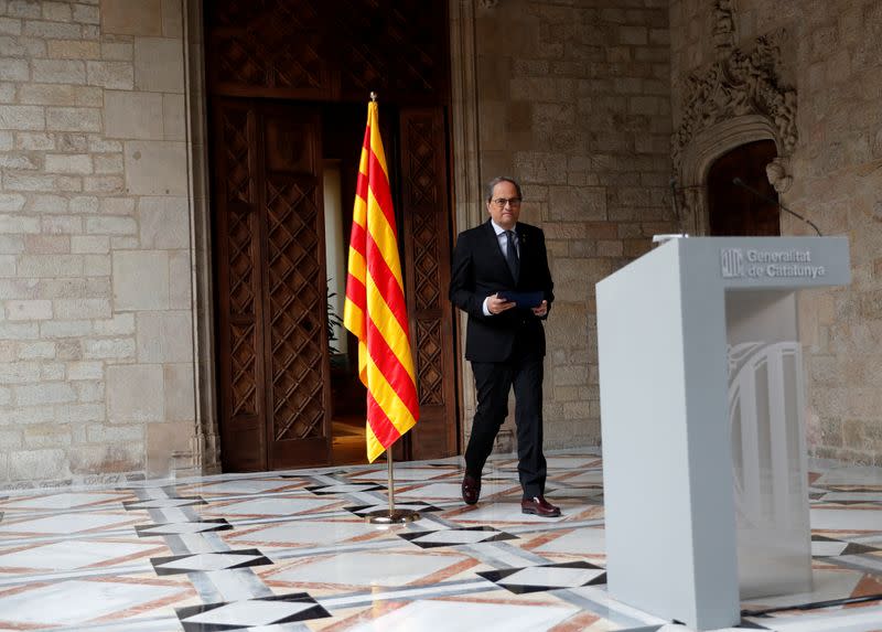 The leader of Catalonia's regional government Quim Torra arrives to deliver a statement at Palau de la Generalitat in Barcelona