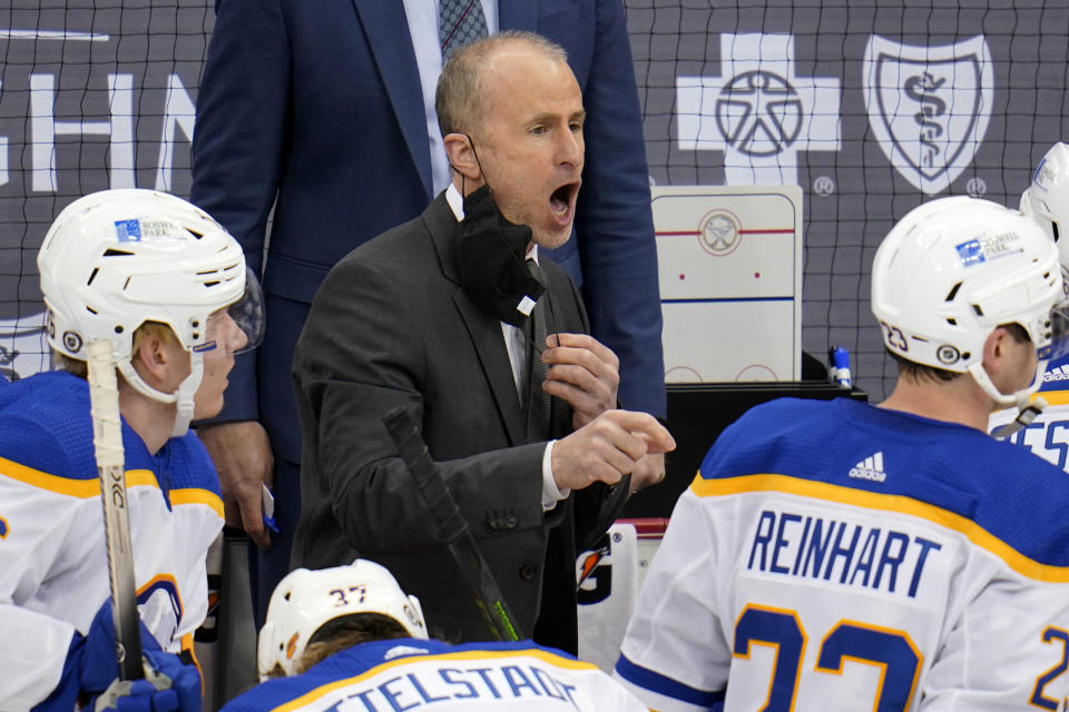 FILE- In this May 8, 2021, file photo, Buffalo Sabres coach Don Granato directs his team during the third period of an NHL hockey game against the Pittsburgh Penguins in Pittsburgh. (AP Photo/Gene J. Puskar, File)