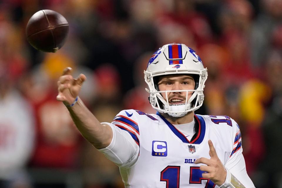 Buffalo Bills quarterback Josh Allen (17) throws a pass during the first half of an NFL divisional round playoff football game against the Kansas City Chiefs, Sunday, Jan. 23, 2022, in Kansas City, Mo. (AP Photo/Charlie Riedel)