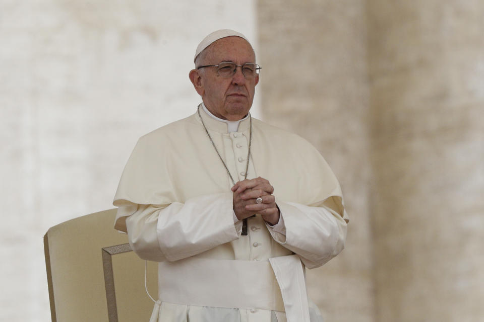 In this Wednesday, May 2, 2018 file photo Pope Francis prays during his weekly general audience, in St.Peter's Square at the Vatican. The Vatican said Thursday Aug. 2, 2018 that Pope Francis had changed the Catechism of the Catholic Church about the death penalty, saying it can never be sanctioned because it "attacks" the inherent dignity of all humans. (AP Photo/Andrew Medichini, file)