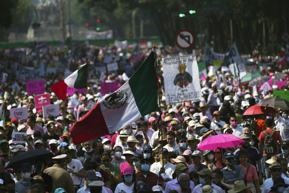 Citizen organizations march in support of Mexico's National Elections Institute as President Andrés Manuel López Obrador pushes to reform it, in Mexico City, Sunday, Nov. 13, 2022. (AP Photo/Marco Ugarte)