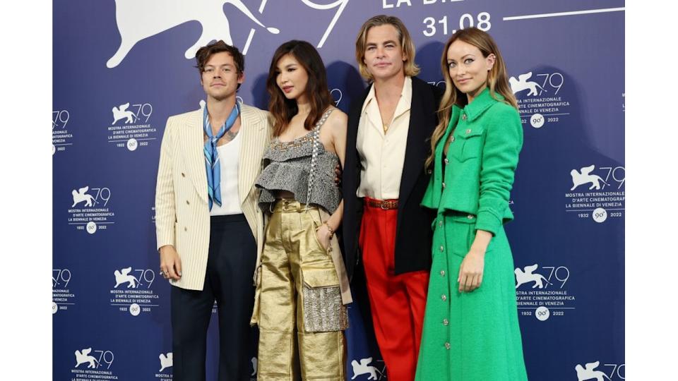 four people posing at film premiere