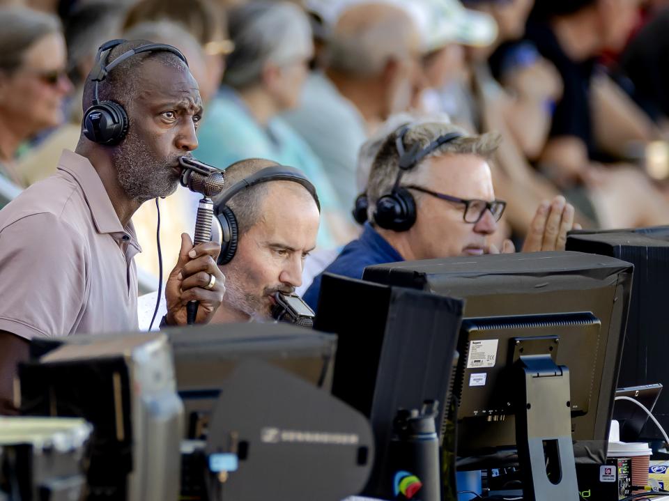 Pictured left, American Olympic legend Michael Johnson commentating for the BBC at the World Athletics Championships in Oregon. 