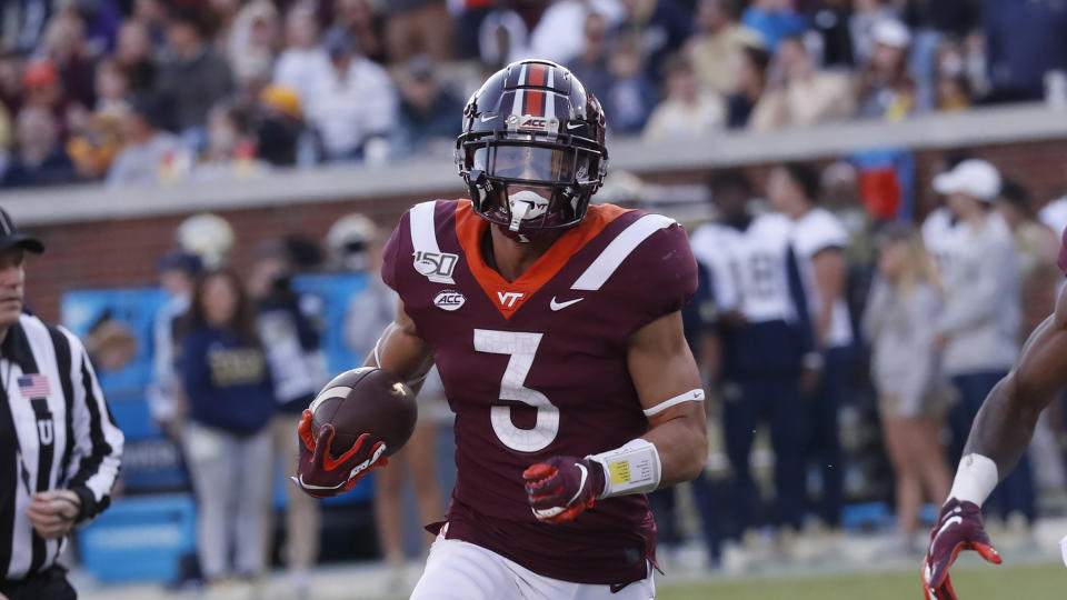 Virginia Tech defensive back Caleb Farley (3) returns an interception for a touchdown in the first half of an NCAA football game against Georgia Tech Saturday, Nov. 16, 2019, in Atlanta. (AP Photo/John Bazemore)