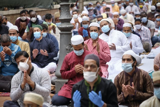 Muslims wore face masks while attending prayers for Eid al-Fitr in Rome’s Piazza Vittorio Square 