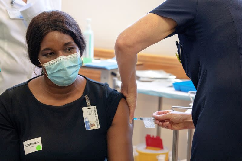 FILE PHOTO: COVID-19 vaccination at Khayelitsha Hospital near Cape Town