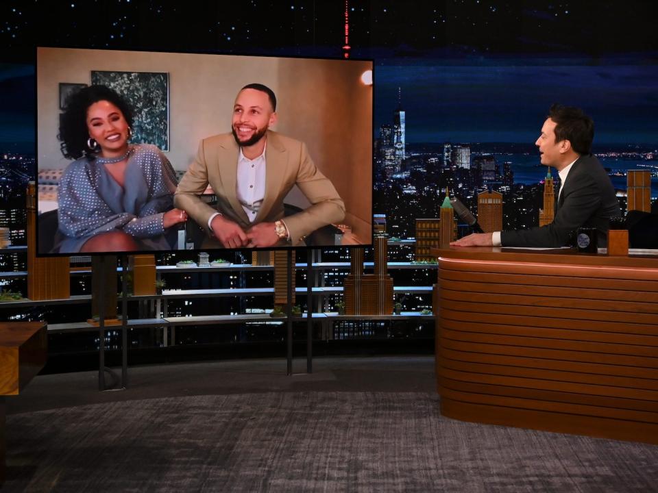 Ayesha and Stephen Curry appear as guests on a screen on "The Tonight Show Starring Jimmy Fallon."