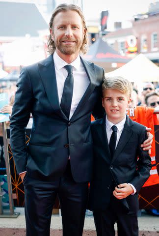 <p>Jason Kempin/Getty</p> Dierks Bentley and son Knox are seen on the Red Carpet before the 2023 NHL Awards in 2023