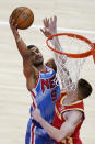 Brooklyn Nets' Timothe Luwawu-Cabarrot shoots the ball next to Atlanta Hawks' Kevin Huerter (3) during the first half of an NBA basketball game Wednesday, Jan. 27, 2021, in Atlanta. (AP Photo/Brynn Anderson)