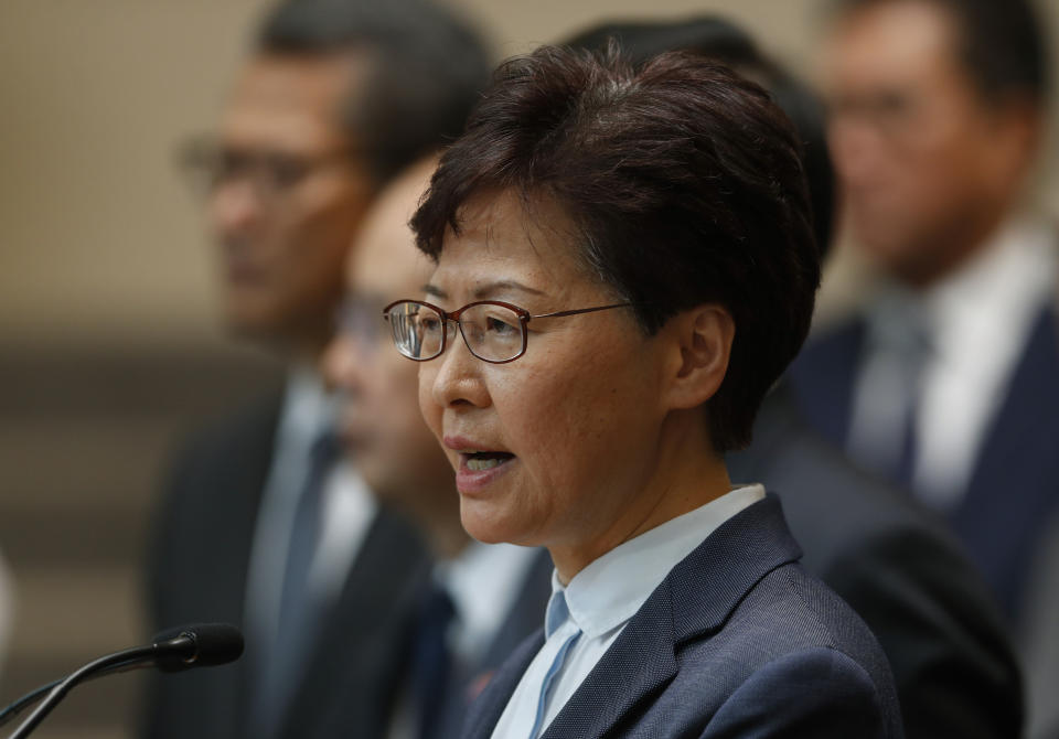 Hong Kong Chief Executive Carrie Lam speaks to reporters during a press conference in Hong Kong Monday, July 22, 2019. Hong Kong leader Carrie Lam denies that police colluded with the masked assailants who indiscriminately attacked residents in a subway station. Lam called "unfounded" allegations that the police were working together with the Yuen Long station assailants, who beat people Sunday evening using steel pipes and wooden poles. (AP Photo/Vincent Yu)