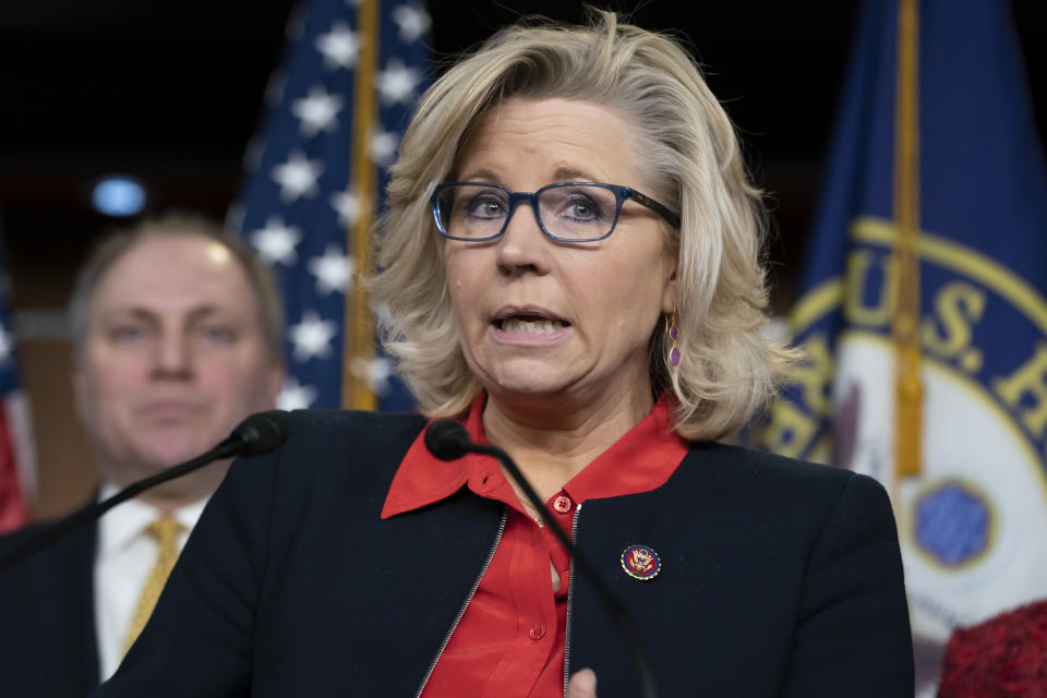 FILE - In this Feb. 13, 2019 file photo, House Republican Conference chair Rep. Liz Cheney, R-Wyo., with House Minority Whip Steve Scalise, R-La., at right, talks to reporters during a news conference at the Capitol in Washington. (AP Photo/J. Scott Applewhite)